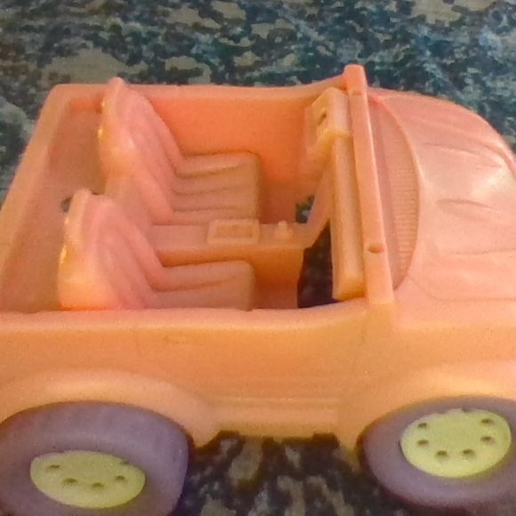 a pink kids toy car - Picture 1 of 2